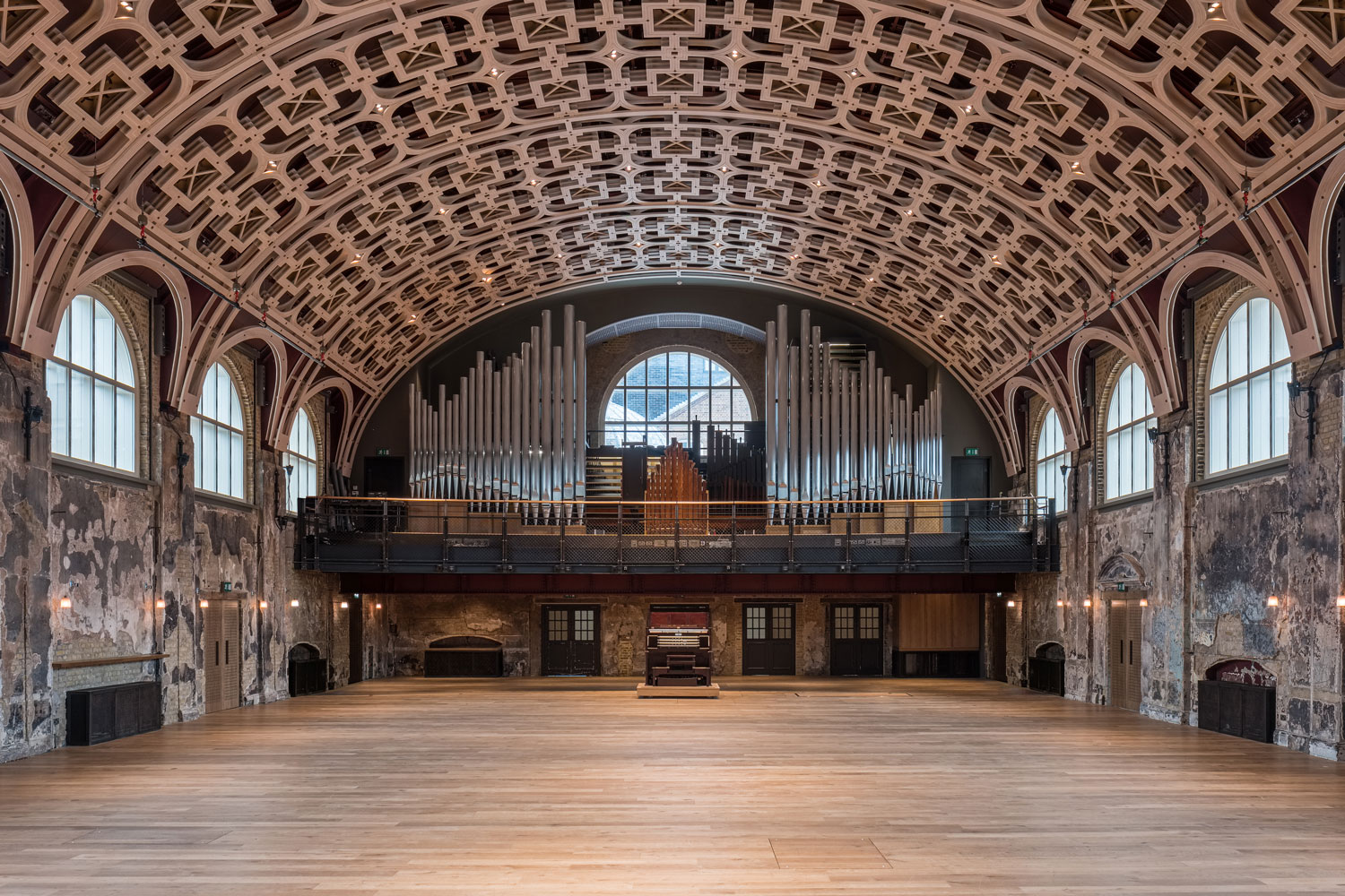 Grand Hall with organ A Victorian town hall, with a large organ on the far balcony and a modern lattice-wood ceiling