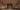 custodians grand hall Our grand hall, a room with an intricate wood panelled ceiling, arches above distressed plaster walls, and a wooden floor. It is empty except for Mo, the custodian, a woman sitting in the left hand corner