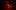 POINT 10- The Masque of the Red Death A girl appears to float in the middle of a red lit room, with a number of lampshades also suspended