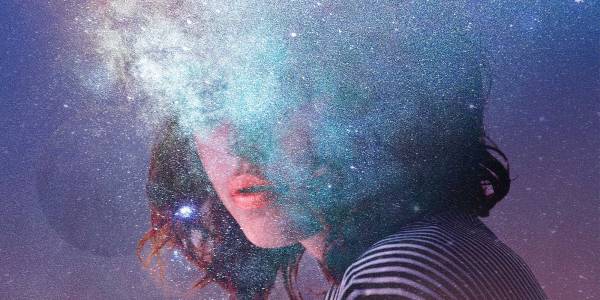 Helen An image of the bottom half of a womans face covered by stars and constellations.